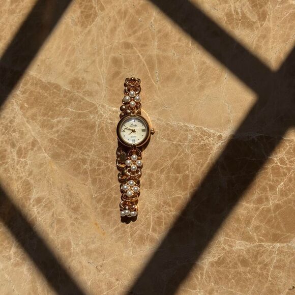 Women\'s Gold and Pearl Watch